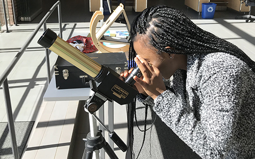 Student using Telescope Student using Telescope
